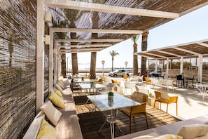 Lunch, dinner served; Mediterranean cuisine, beach views