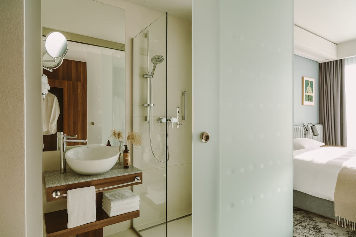 shower, designer toiletries, hair dryer, heated floors