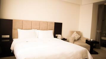 Ropa de cama de alta calidad y minibar