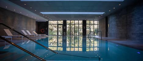 Indoor pool, open 9:00 AM to 9:00 PM, sun loungers