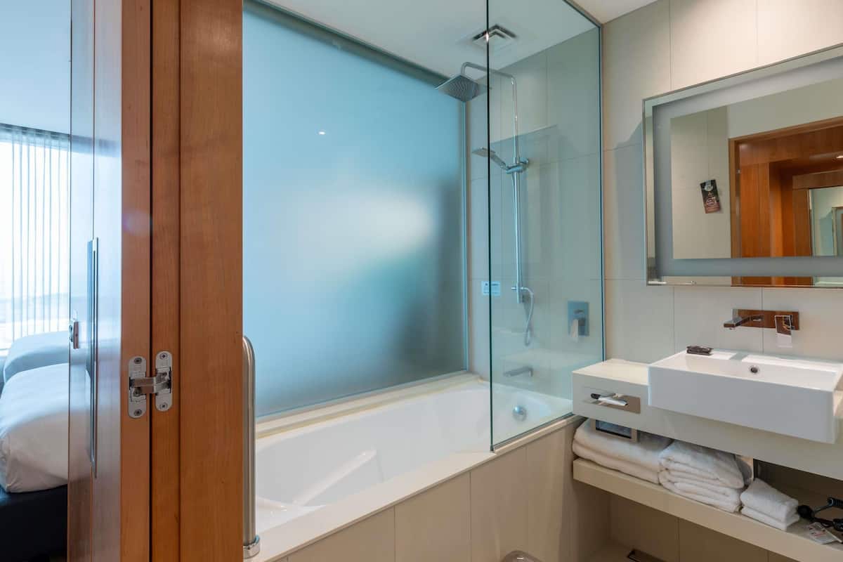 superior room, 1 king bed, accessible | 1 bedroom, in-room safe, desk, blackout curtains