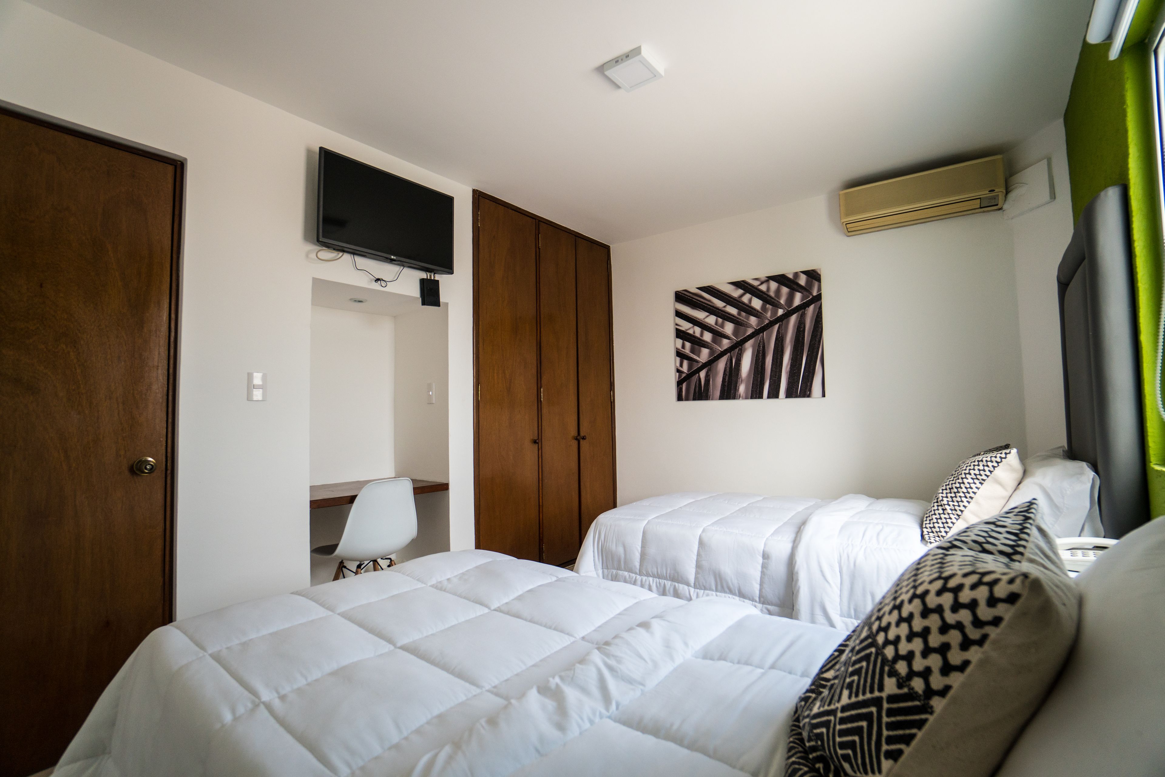superior suite, 2 queen beds, tower | desk, laptop workspace, blackout curtains, free wifi