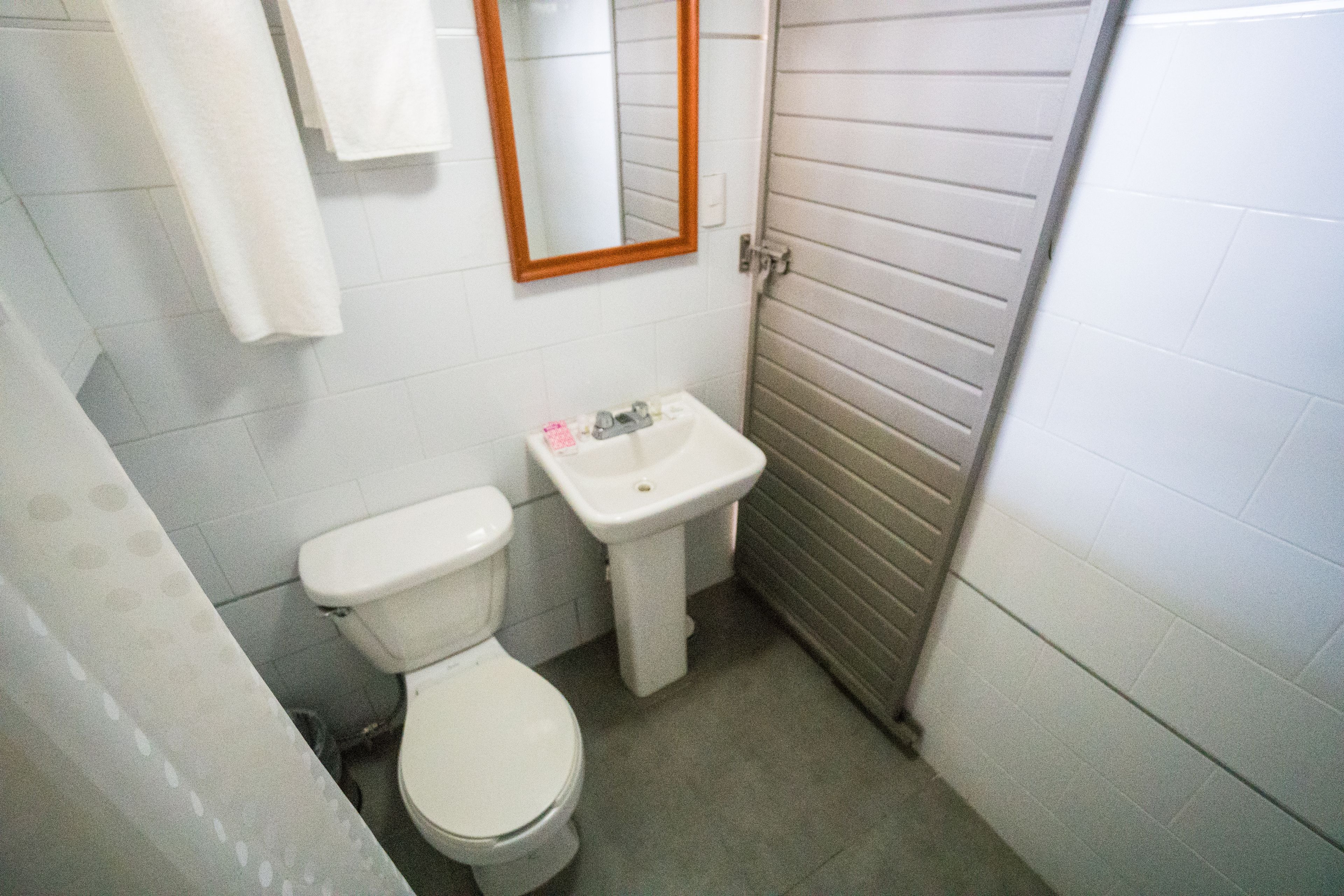 shower, rainfall showerhead, towels, soap