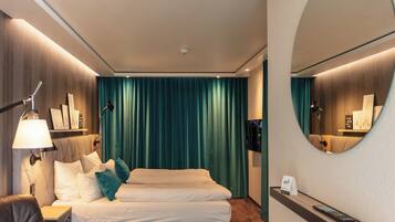 Skrivbord, ljudisolering, gratis wi-fi och sÀngklÀder