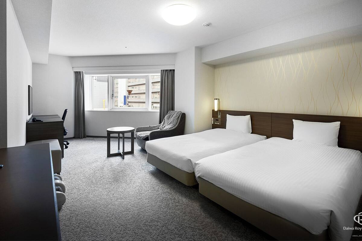 Premium bedding, down comforters, desk, blackout drapes