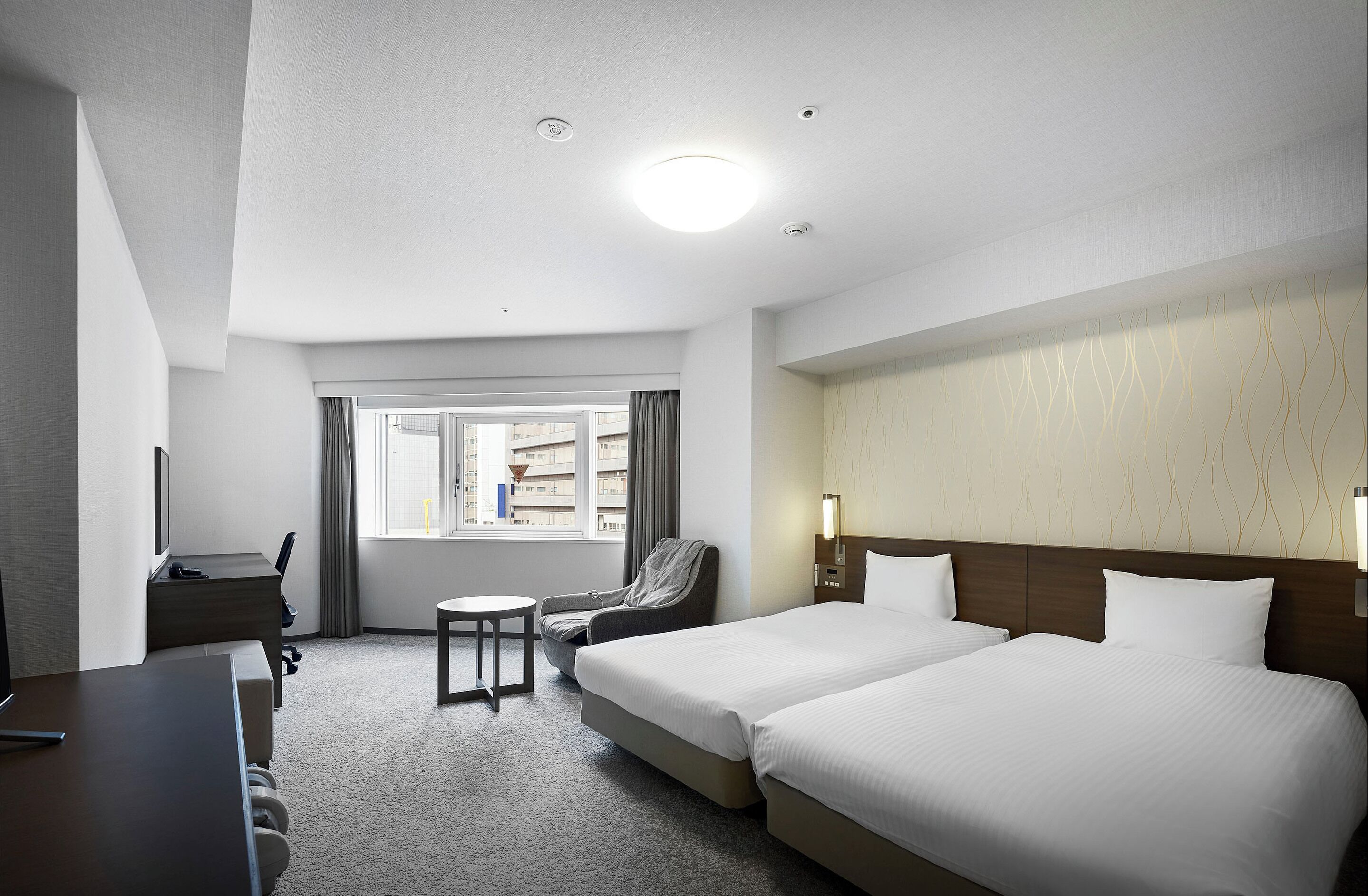 Premium bedding, down comforters, desk, blackout drapes