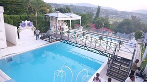 Outdoor pool, pool umbrellas, sun loungers