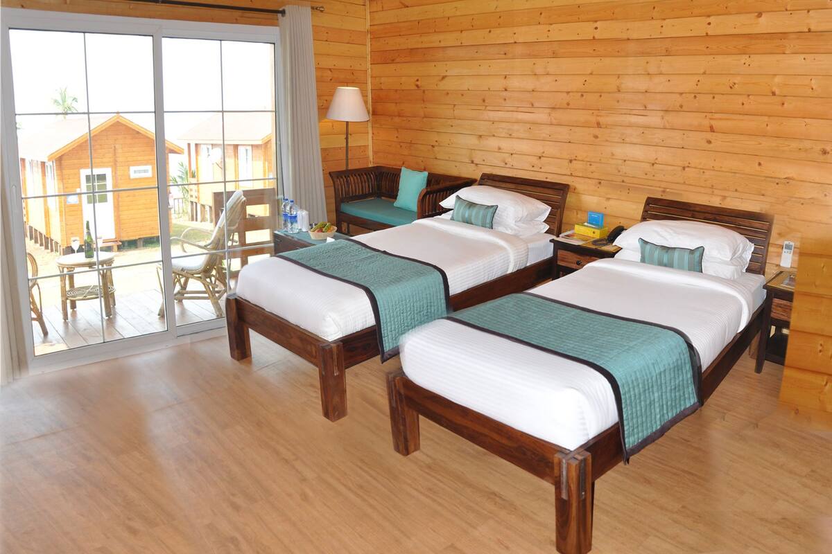 grand cottage, 1 double bed, partial sea view | premium bedding, in-room safe, iron/ironing board, rollaway beds