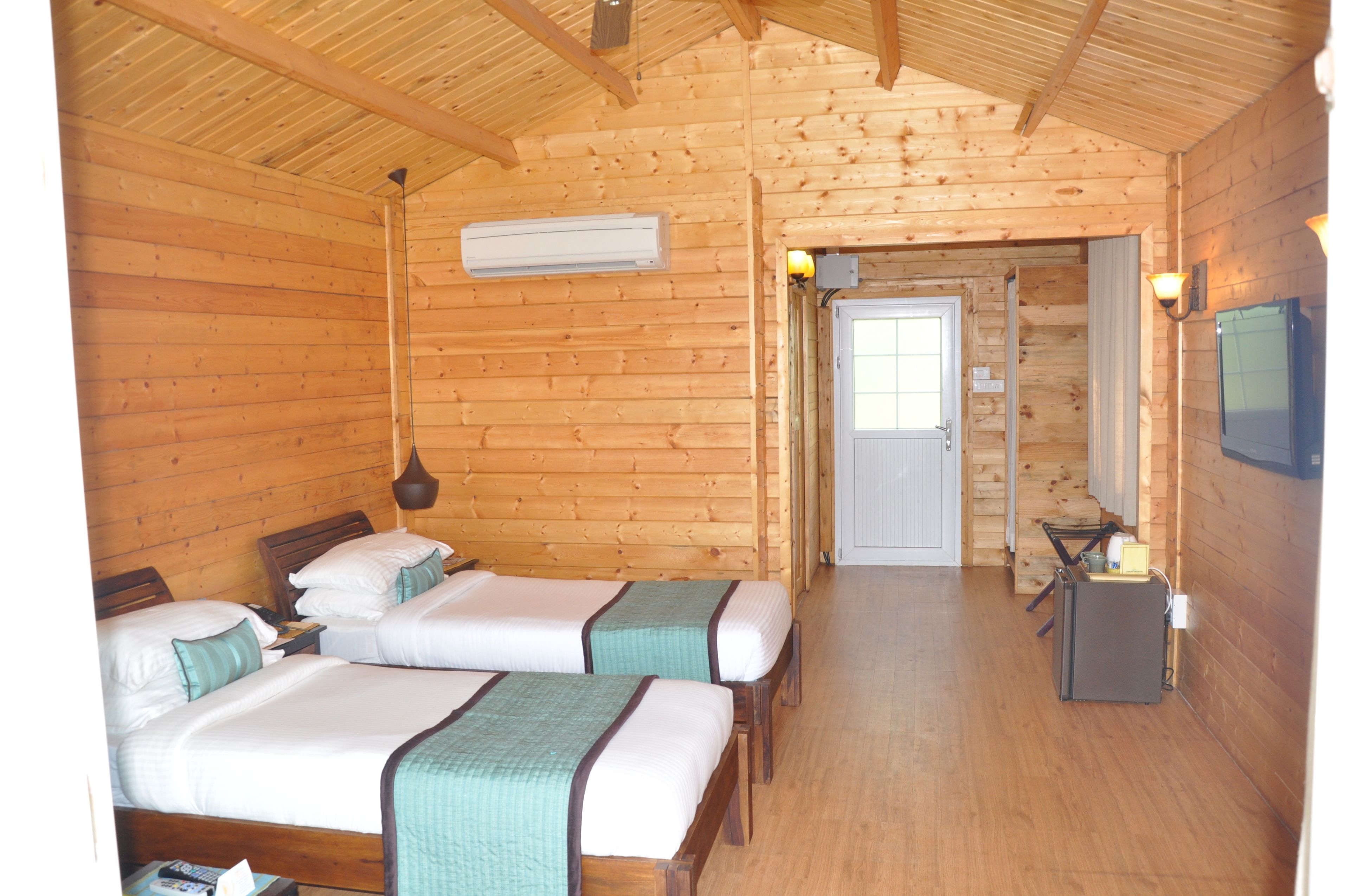 grand cottage, 1 double bed, partial sea view | premium bedding, in-room safe, iron/ironing board, rollaway beds