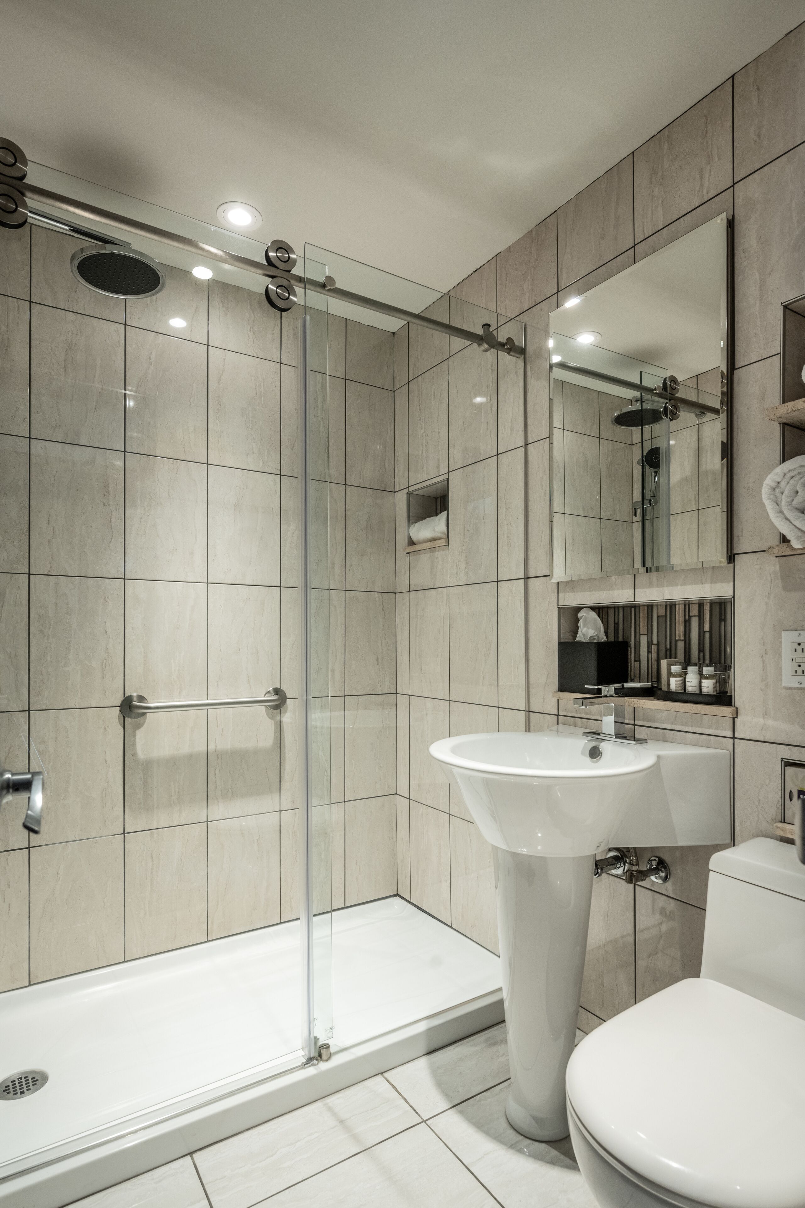 confo | bathroom | shower, rainfall showerhead, designer toiletries, hair dryer