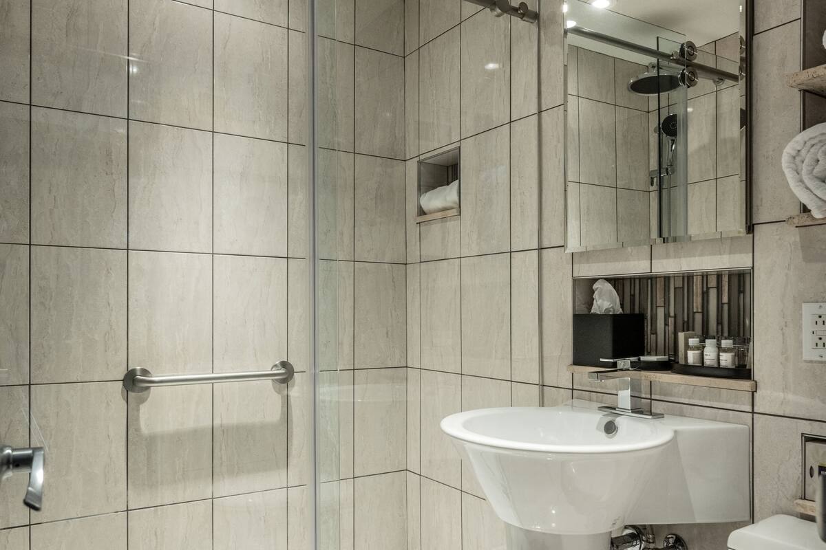 confo | bathroom | shower, rainfall showerhead, designer toiletries, hair dryer