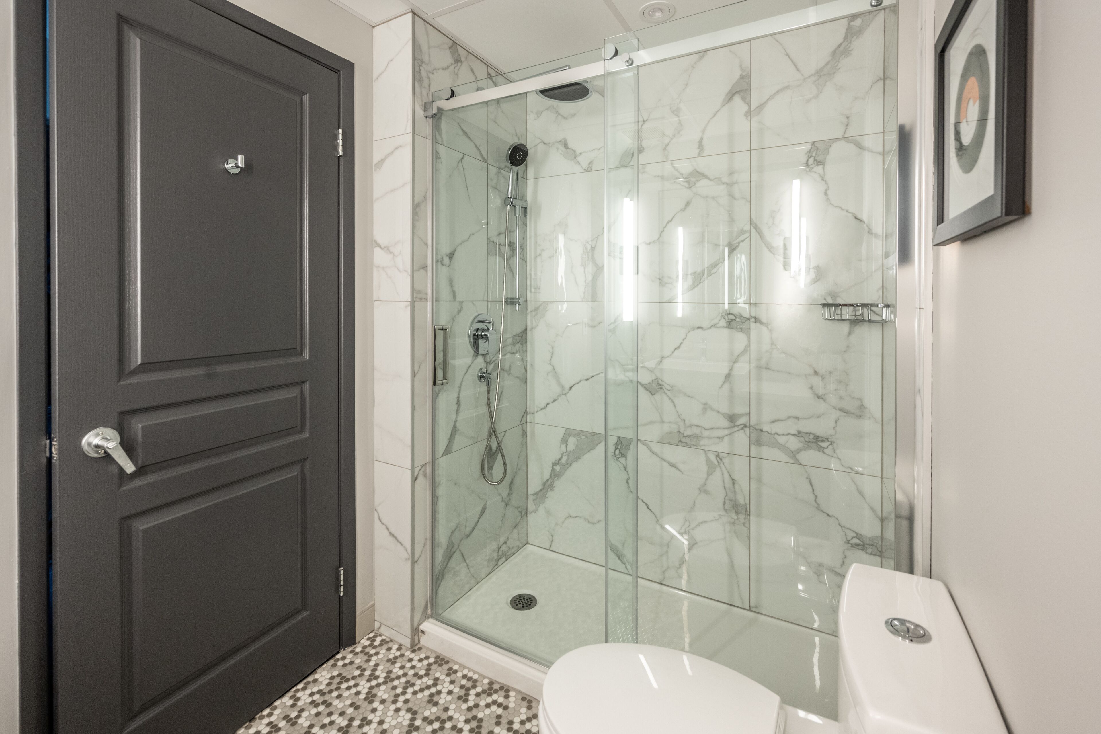 shower, rainfall showerhead, designer toiletries, hair dryer