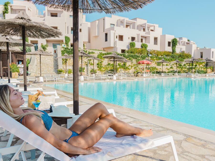 Indoor pool, seasonal outdoor pool, pool umbrellas, pool loungers