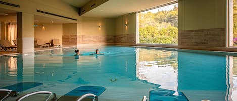 Indoor pool, seasonal outdoor pool, pool umbrellas, sun loungers