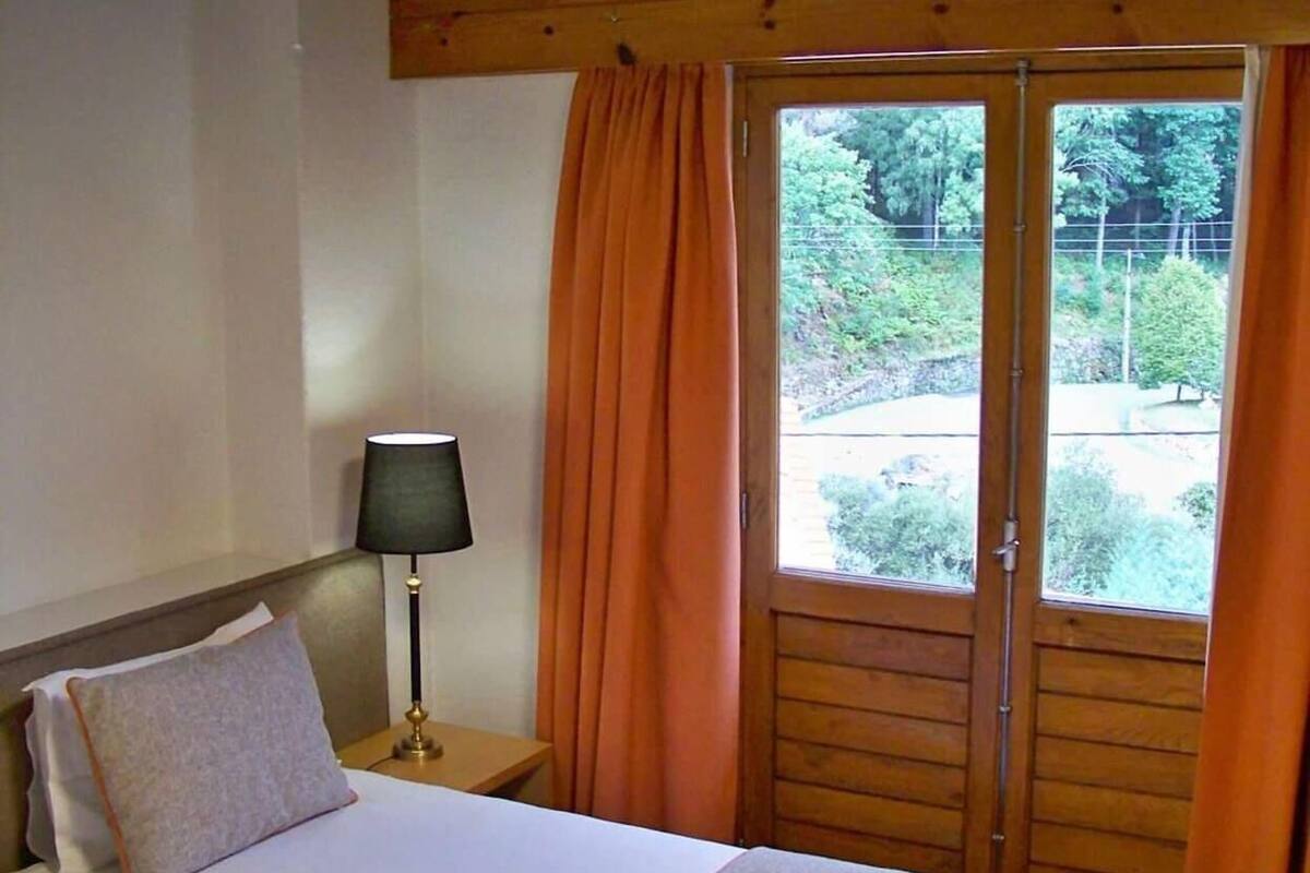 Minibar, desk, laptop workspace, blackout curtains