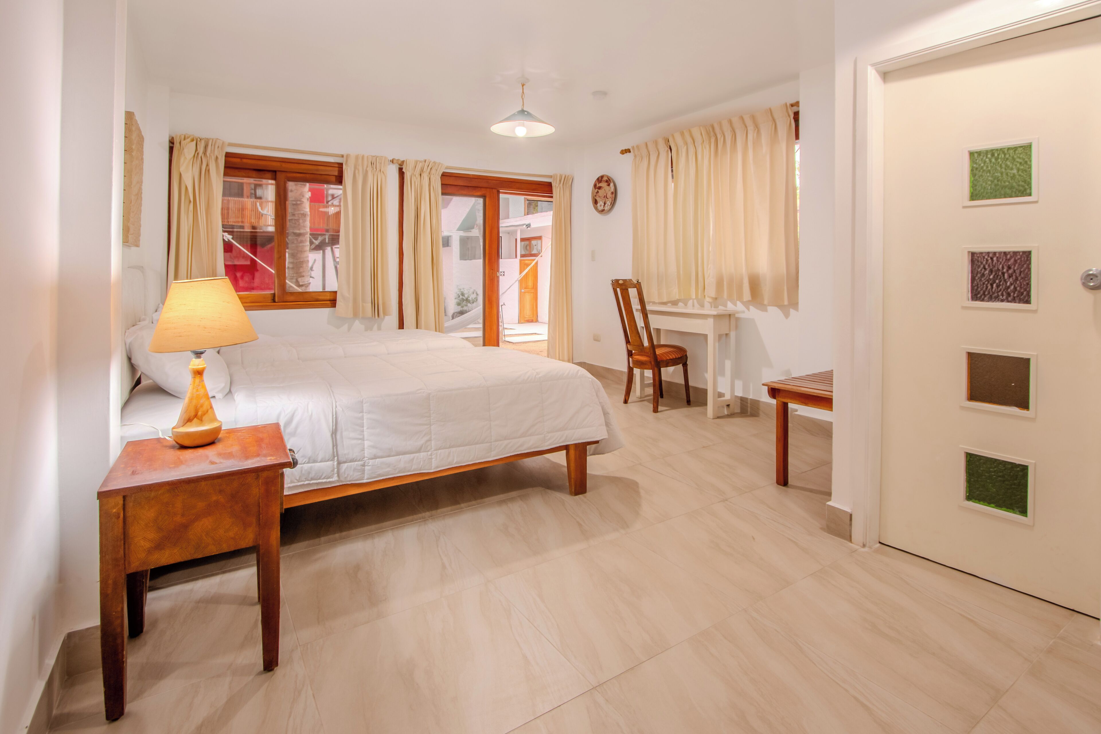 2 twin beds garden view | 1 bedroom, frette italian sheets, premium bedding, down duvets