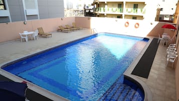 Outdoor pool, pool loungers