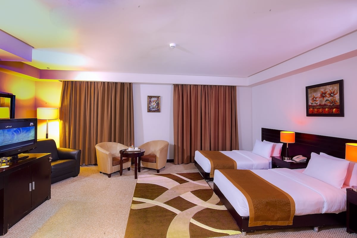 Premium bedding, down comforters, minibar, in-room safe
