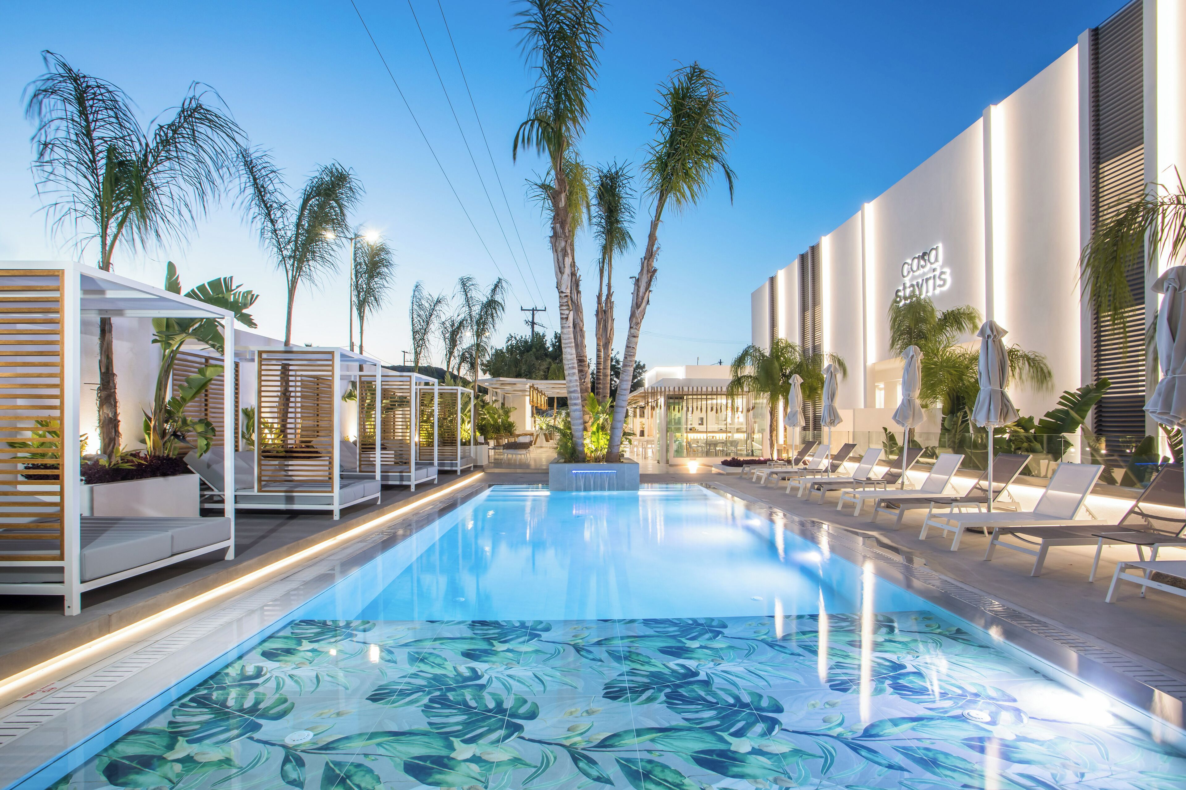 seasonal outdoor pool, open 10:00 am to 6:00 pm, pool umbrellas