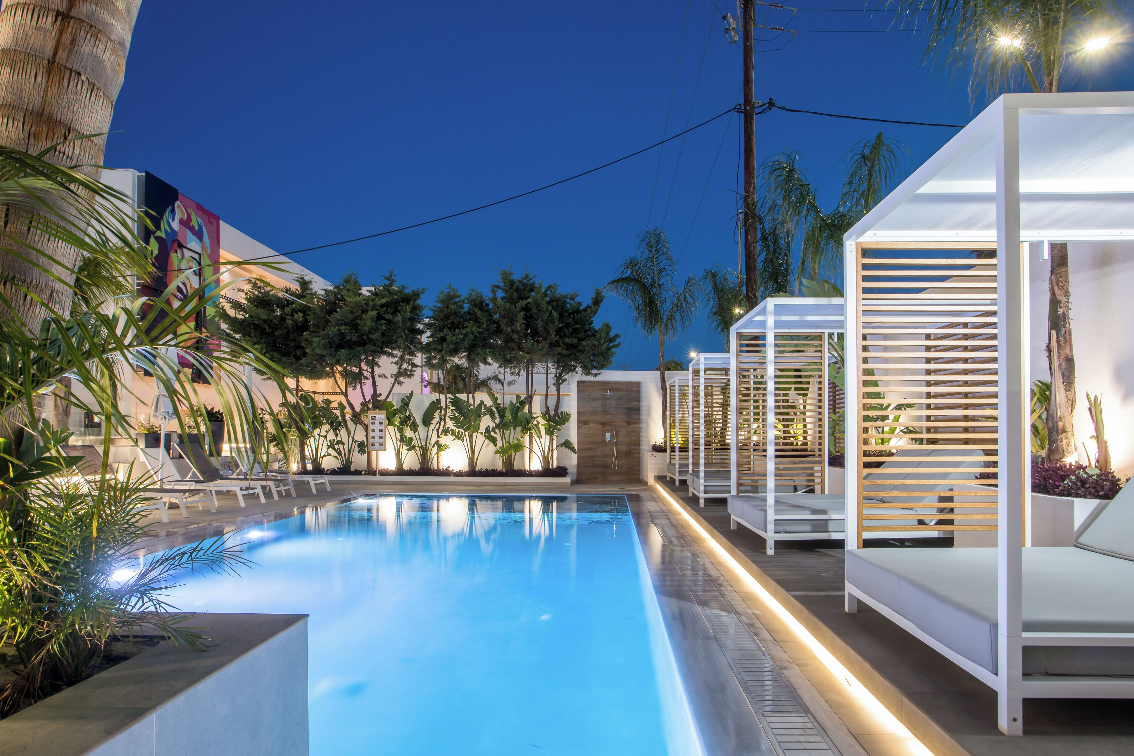 seasonal outdoor pool, open 10:00 am to 6:00 pm, pool umbrellas