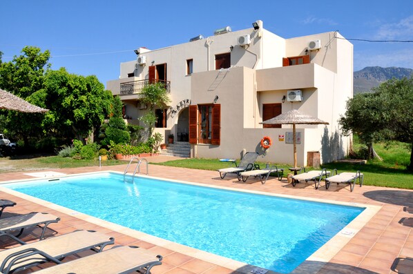 Outdoor pool, pool umbrellas, pool loungers