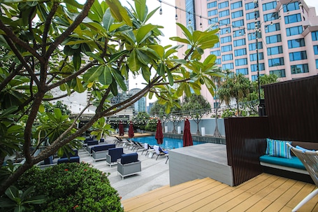 Outdoor pool, pool umbrellas, sun loungers