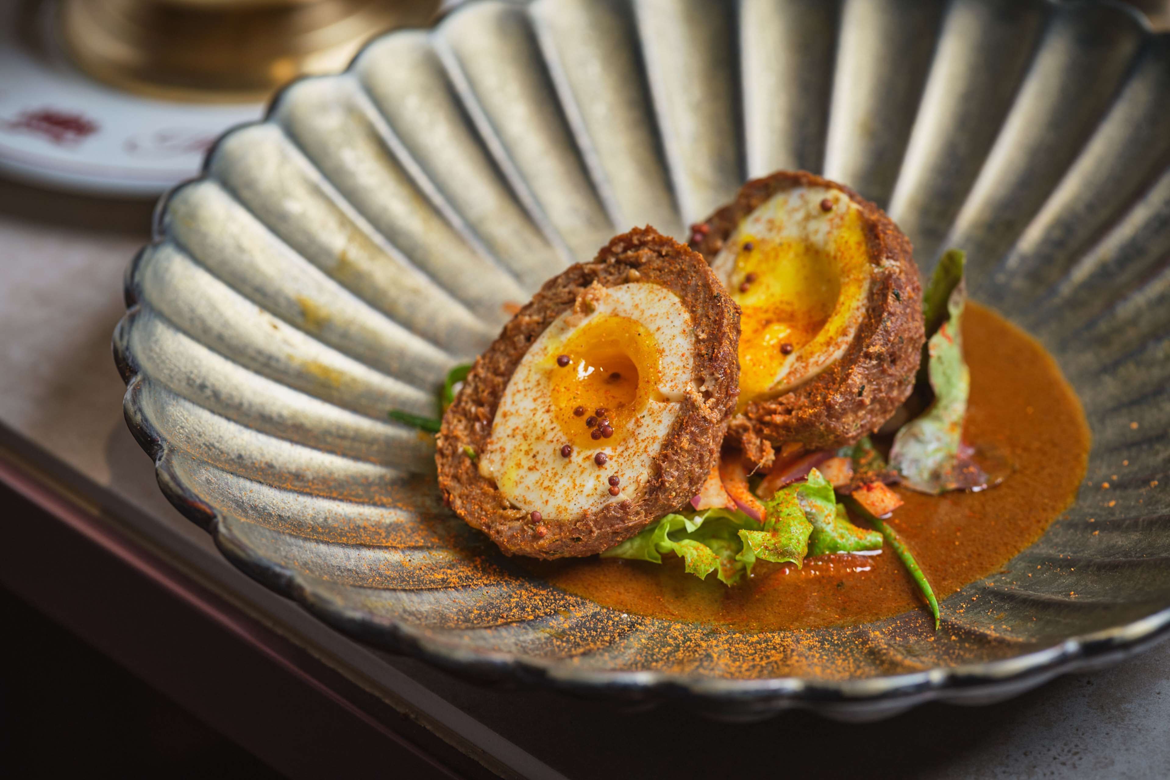 A dish with a scalloped edge plate.