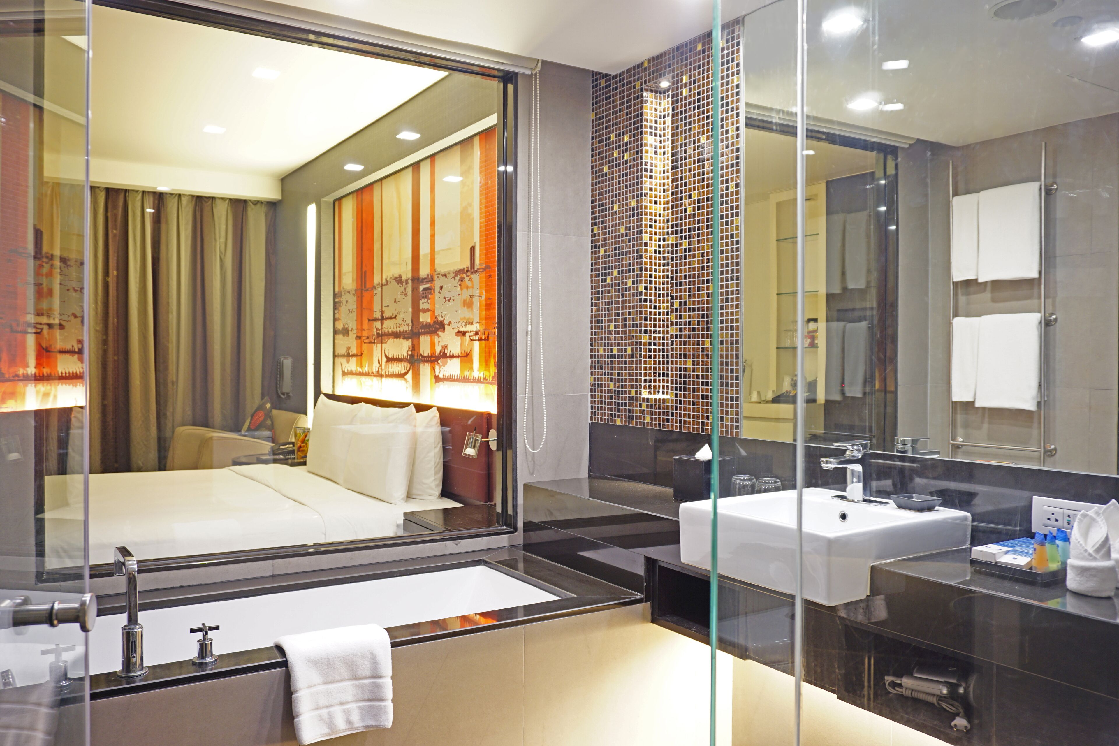 eco-friendly toiletries, hair dryer, slippers, towels