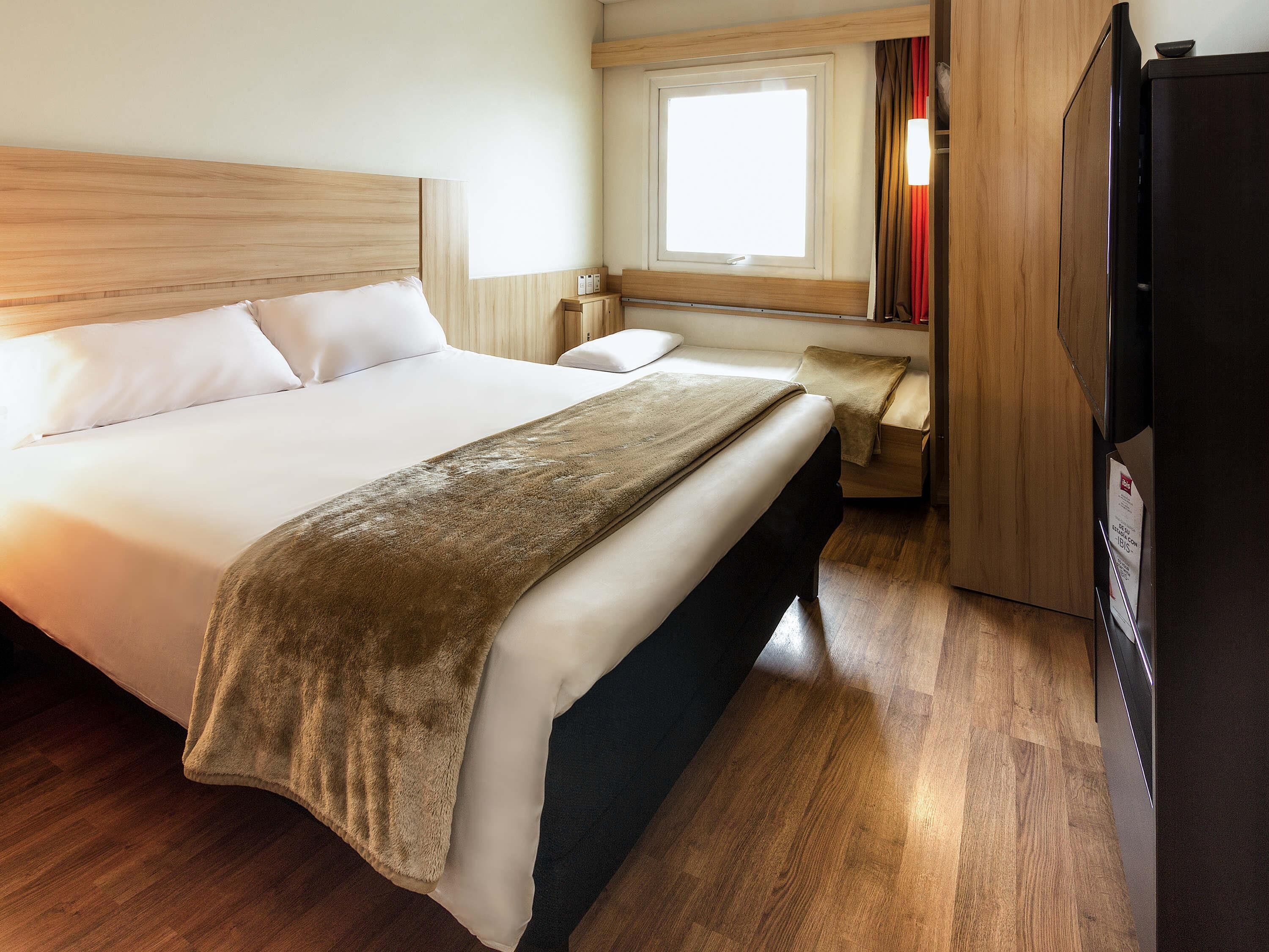 Room, Multiple Beds | In-room safe, desk, cribs (free), WiFi (free)