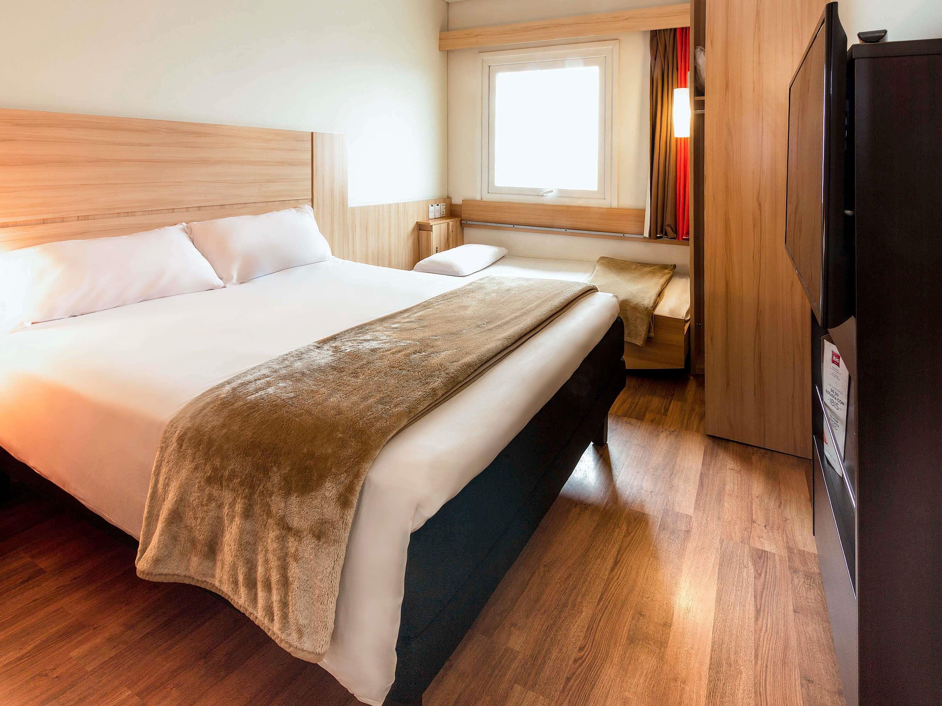 Room, Multiple Beds | In-room safe, desk, free cribs/infant beds, free WiFi