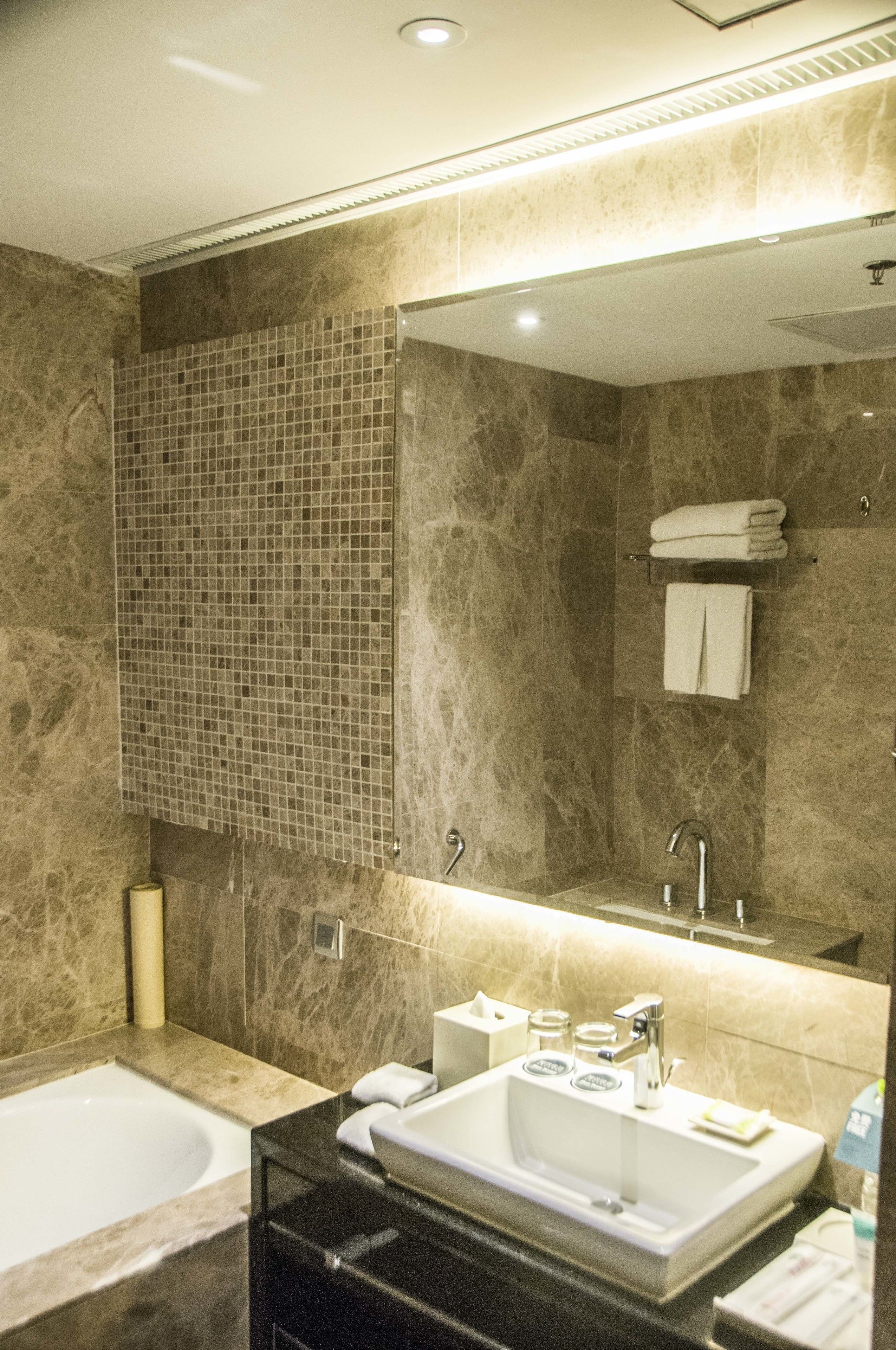 separate bathtub and shower, deep-soaking bathtub, rainfall showerhead