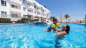 Seasonal outdoor pool, pool umbrellas, pool loungers