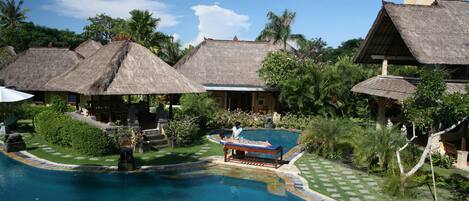 Outdoor pool, open 8:00 AM to 7:00 PM, pool umbrellas, sun loungers