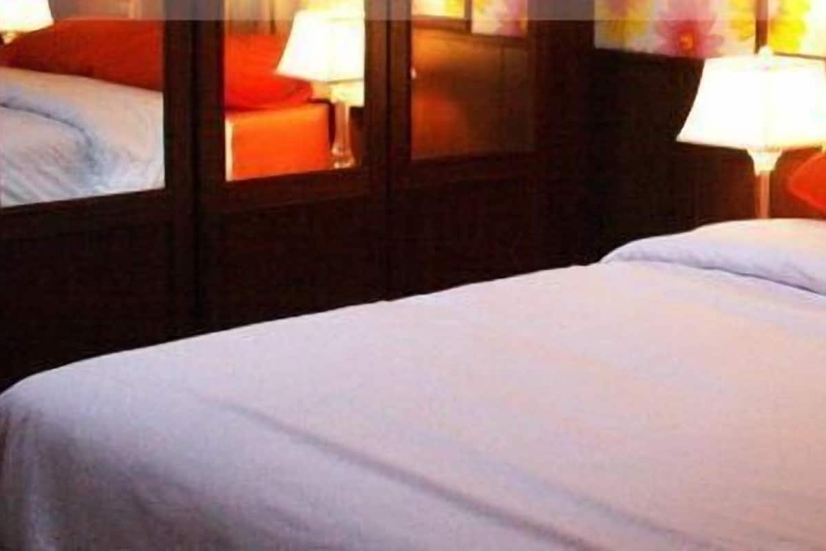 Deluxe tweepersoonskamer | Een minibar, extra bedden, gratis wifi