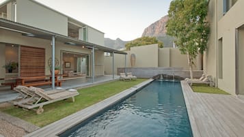 Outdoor pool, pool umbrellas, pool loungers