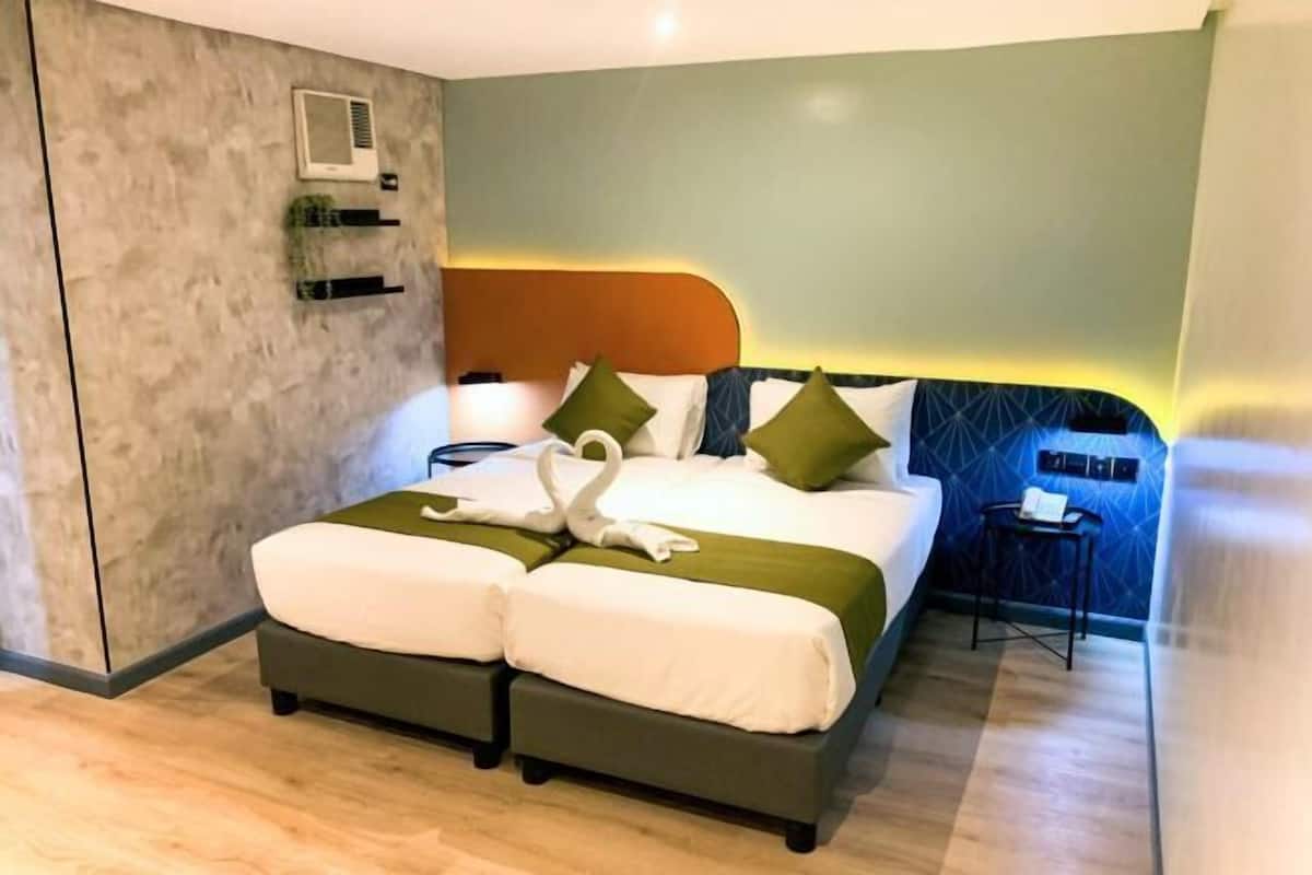 Premium bedding, down comforters, pillowtop beds, in-room safe