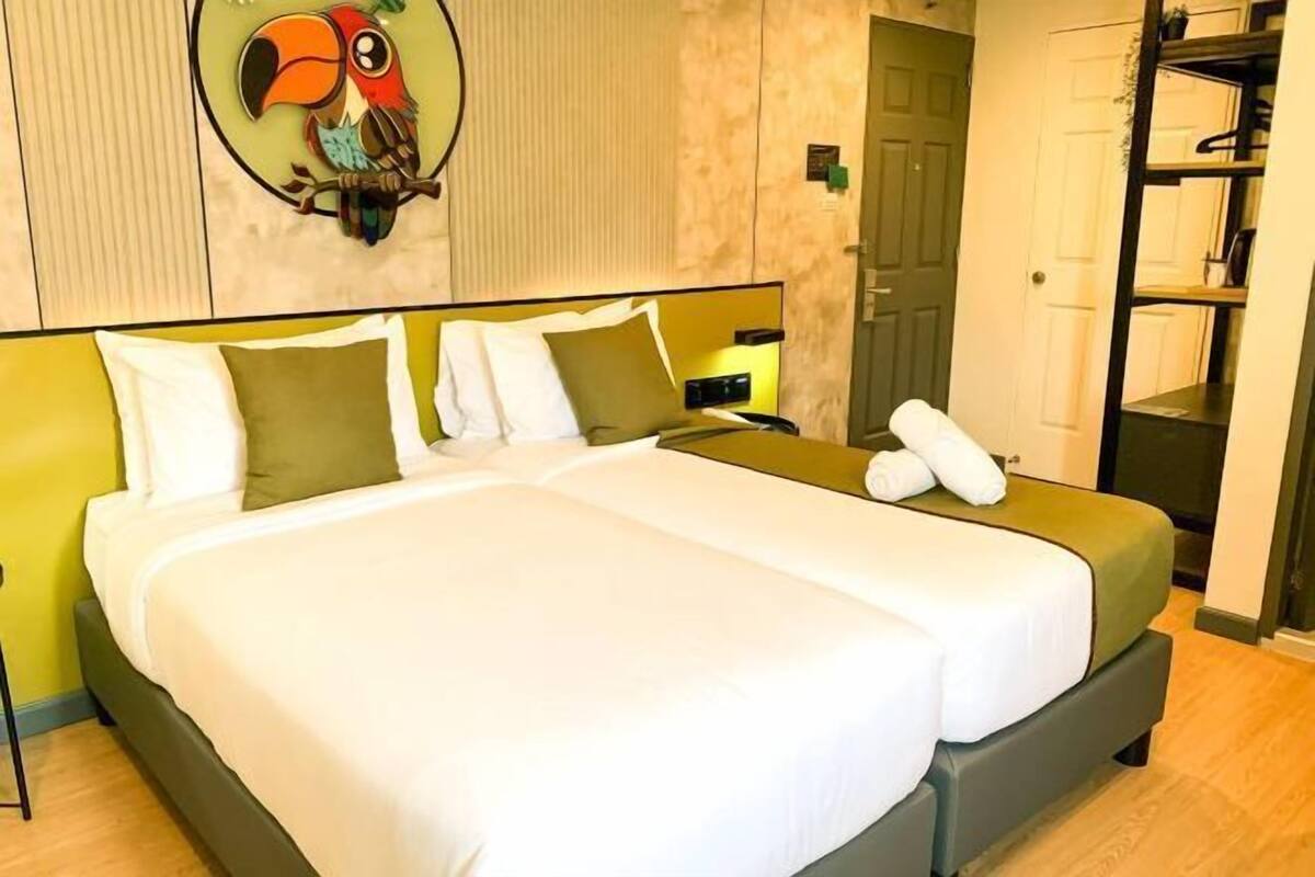 Premium bedding, down duvets, pillow-top beds, in-room safe