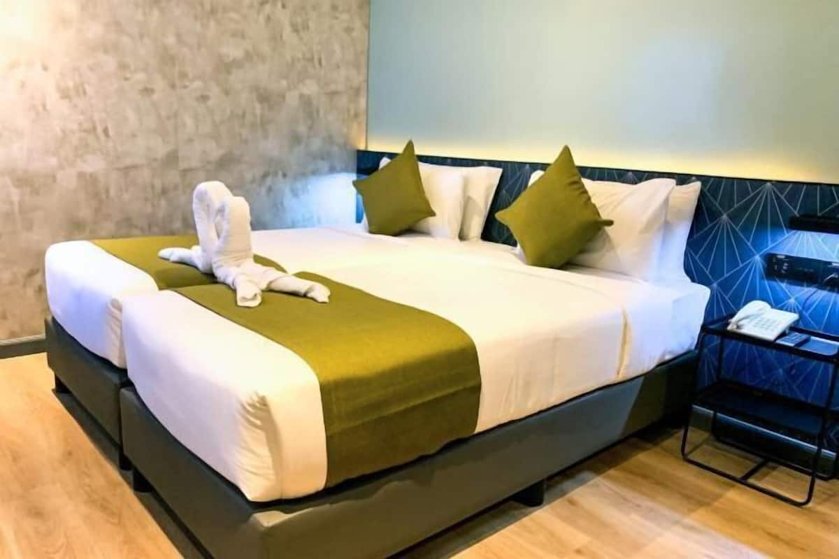 Premium bedding, down comforters, pillowtop beds, in-room safe