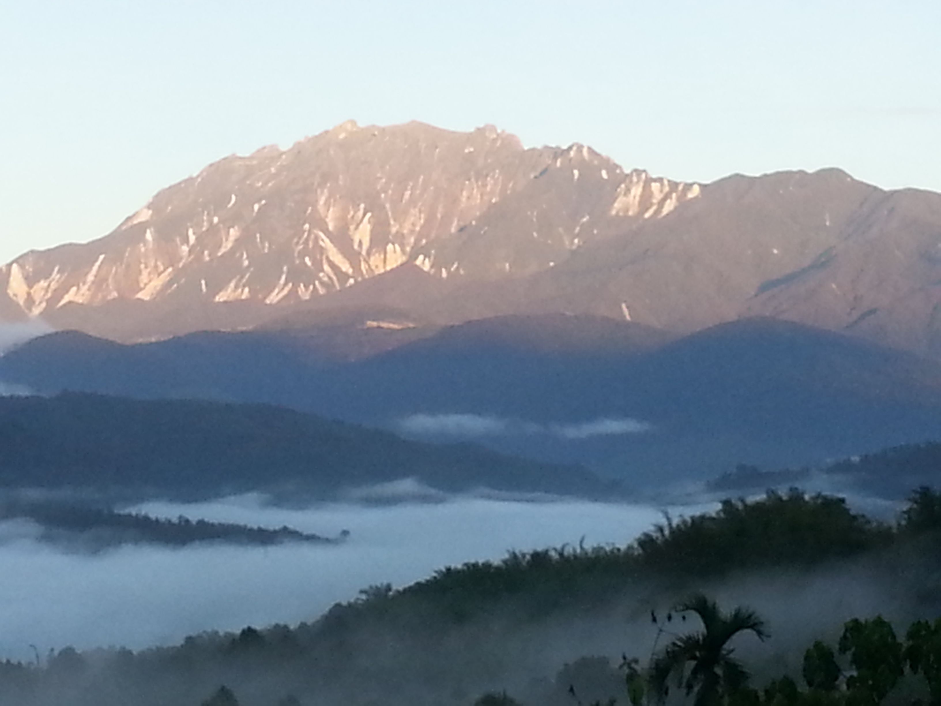 A mountain range with a clear sky.