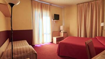 Triple Room | Hypo-allergenic bedding, minibar, in-room safe, desk