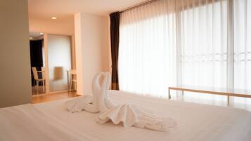 Executive Suite, 1 Bedroom | In-room safe, desk, blackout curtains, iron/ironing board