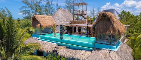 2 outdoor pools, open 9:00 AM to 8 PM, pool loungers