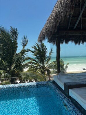 2 outdoor pools, open 11 AM to 8 PM, pool loungers