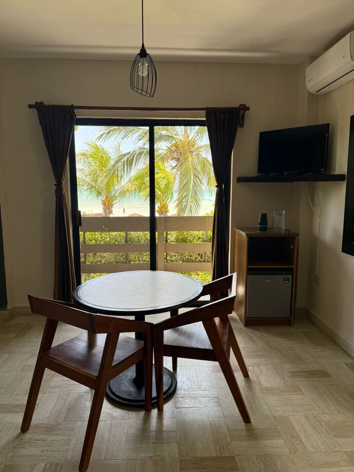 deluxe room, beach view | living area | 32-inch led tv with satellite channels, tv