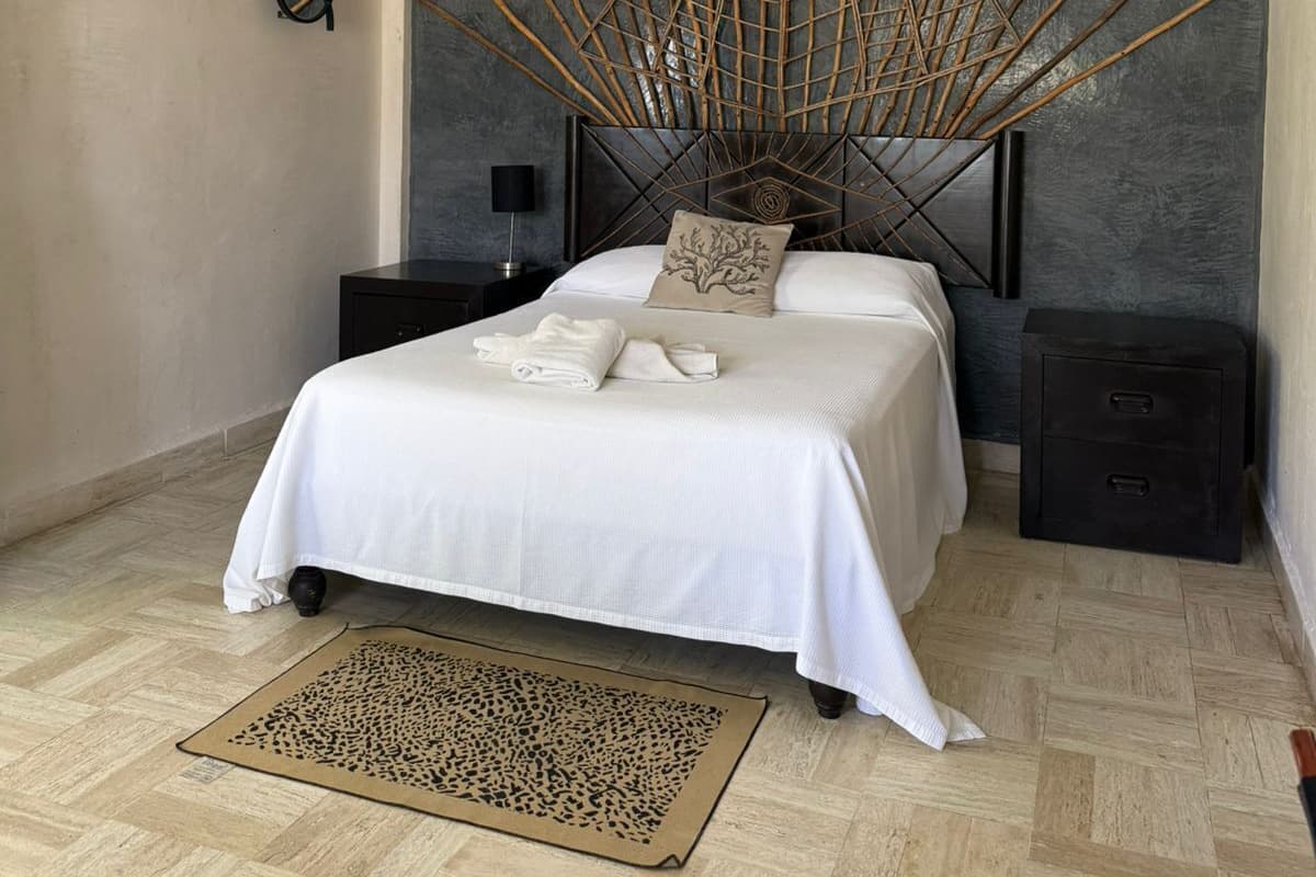 Habitación doble Deluxe, vista a la playa | Wifi gratis y ropa de cama