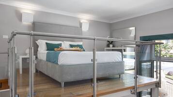 Apartamento superior | Frigobar, cofres nos quartos, cortinas blackout, quartos à prova de som