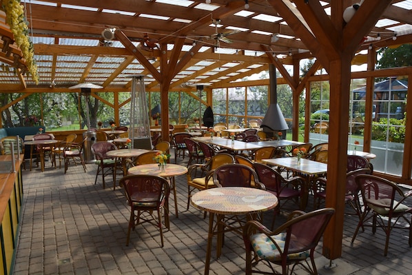 Dinner served, Regional cuisine, garden views