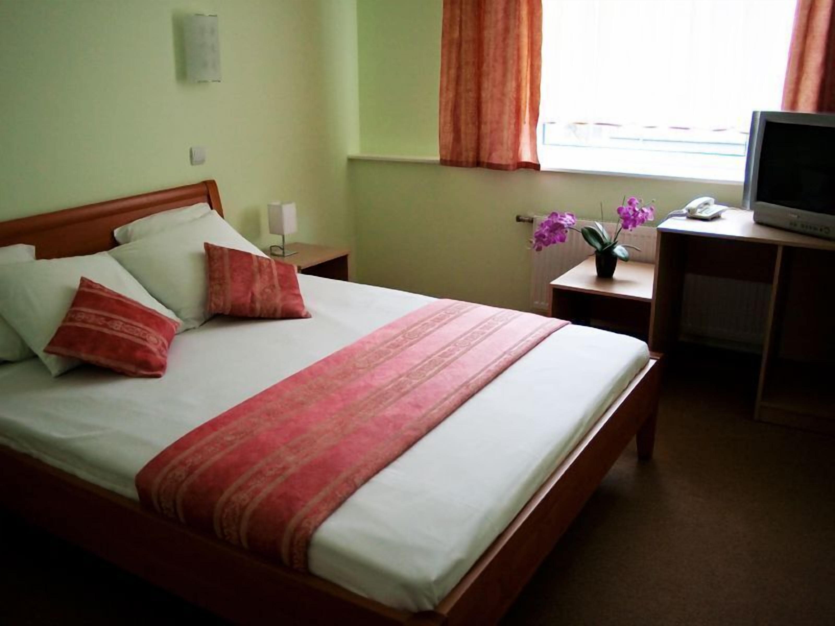 Doppel- oder Zweibettzimmer