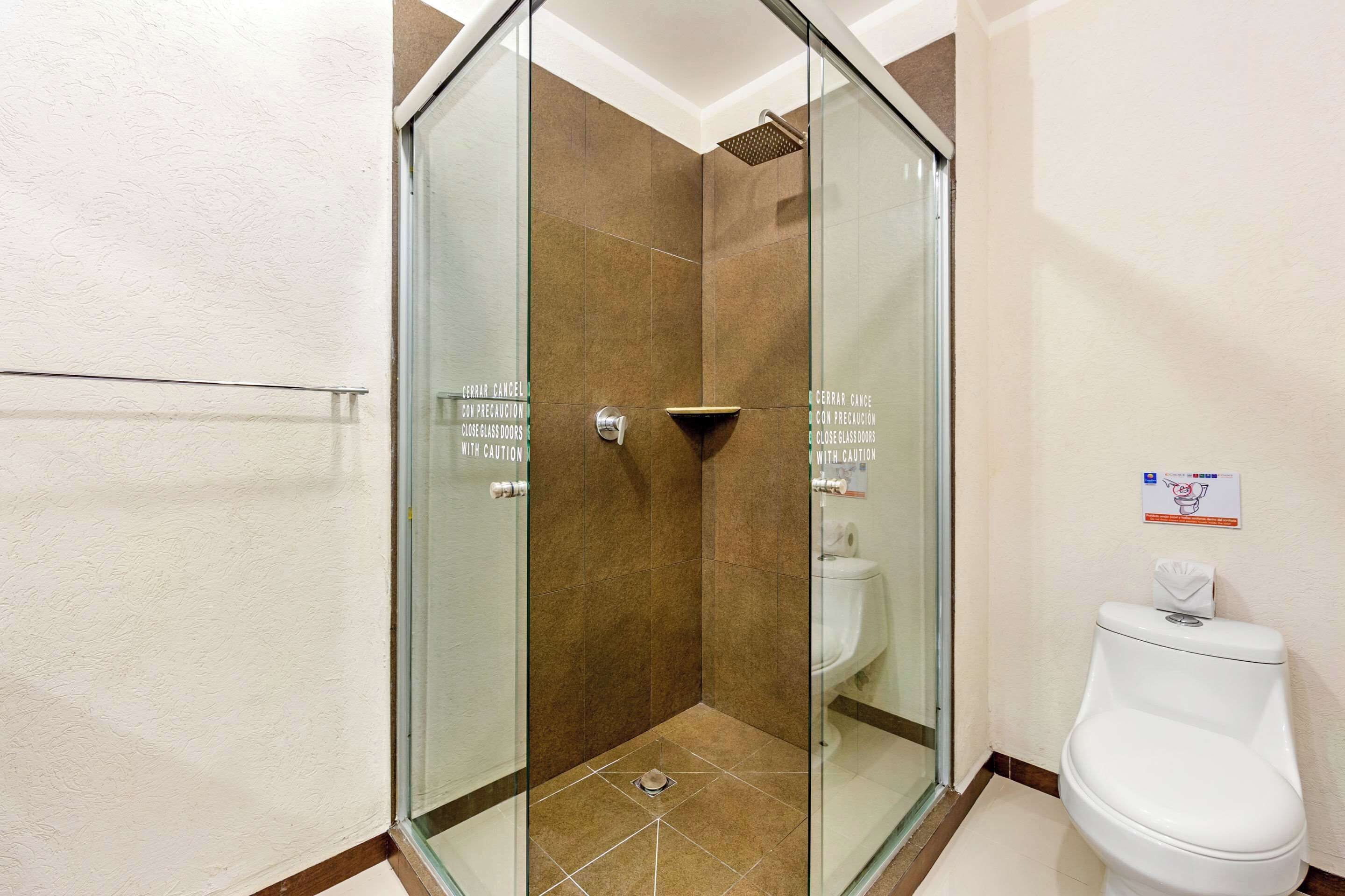 standard double room, 2 double beds, non smoking | bathroom | shower, free toiletries, hair dryer, towels