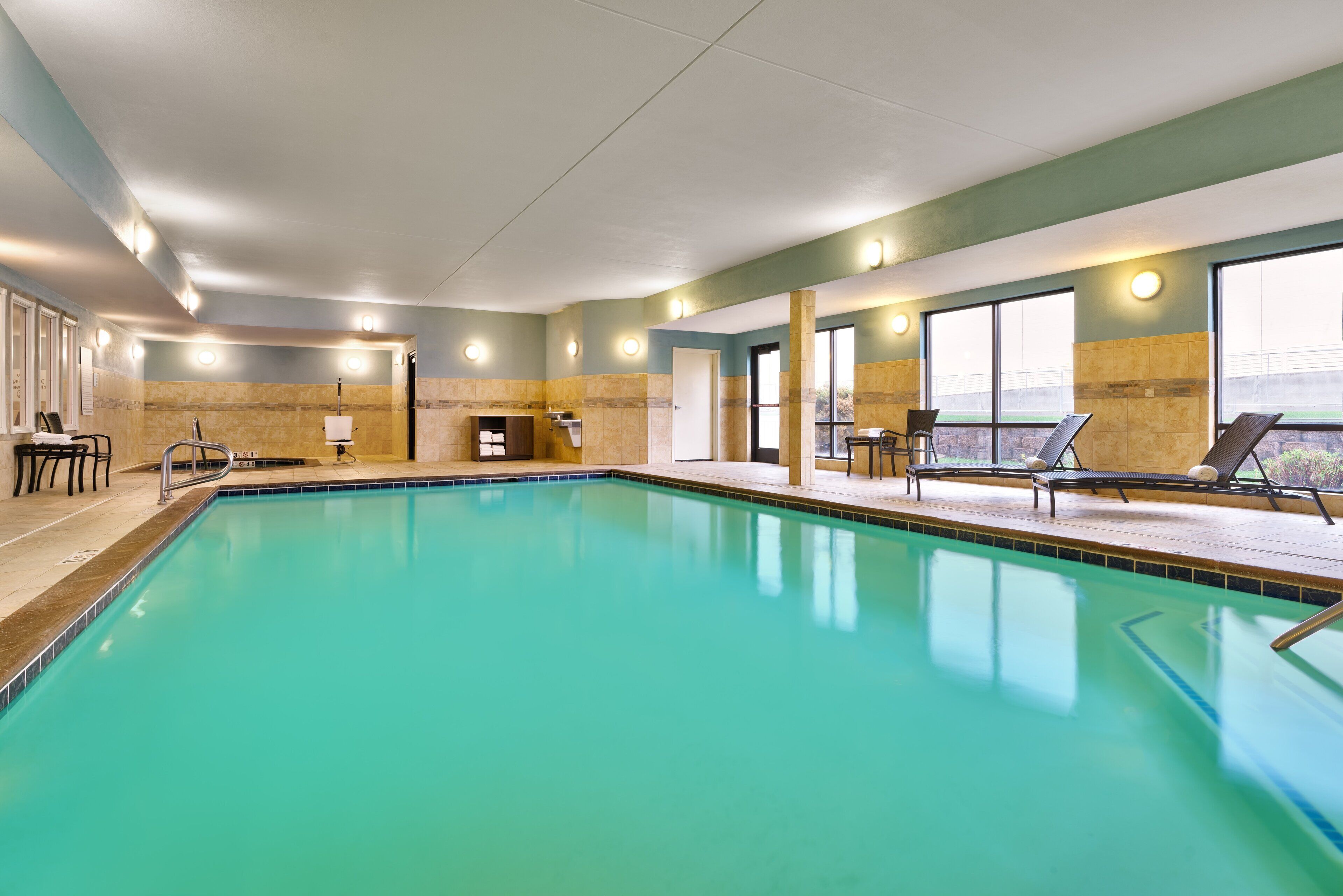 indoor pool, open 6 am to 11 pm, pool loungers